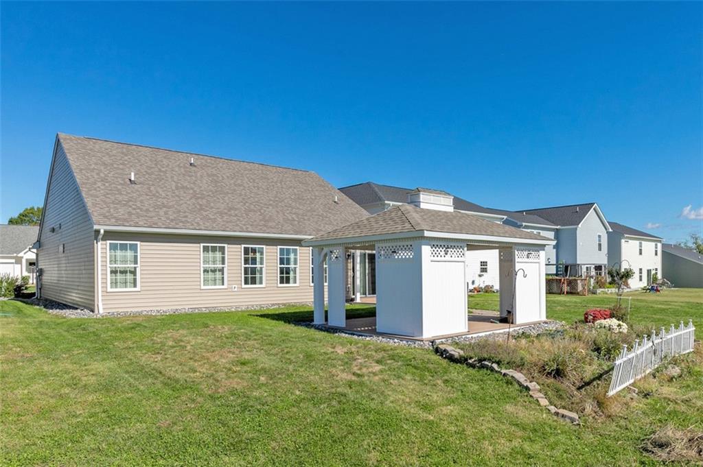 1024 Colonial Drive Uniontown, PA 15401 - Photo 27 of 33 a view of a yard in front of a house with a garden