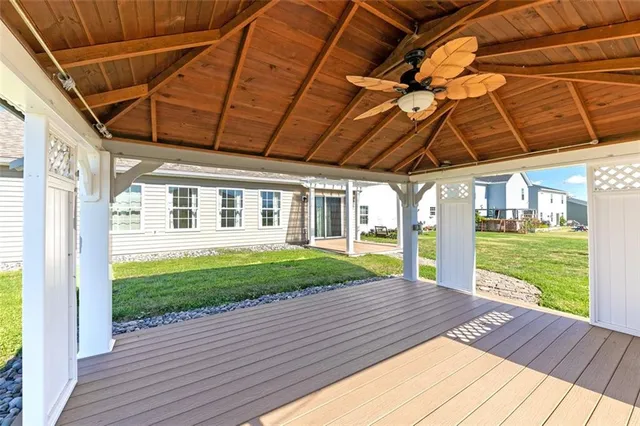 a view of a backyard with wooden floor