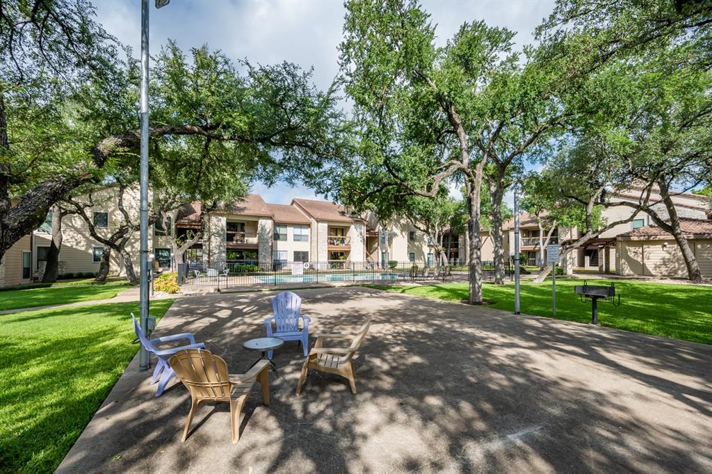 8600 Fathom Circle, Unit 1407 Austin, TX 78750 - Photo 22 of 26 a view of a house with a yard