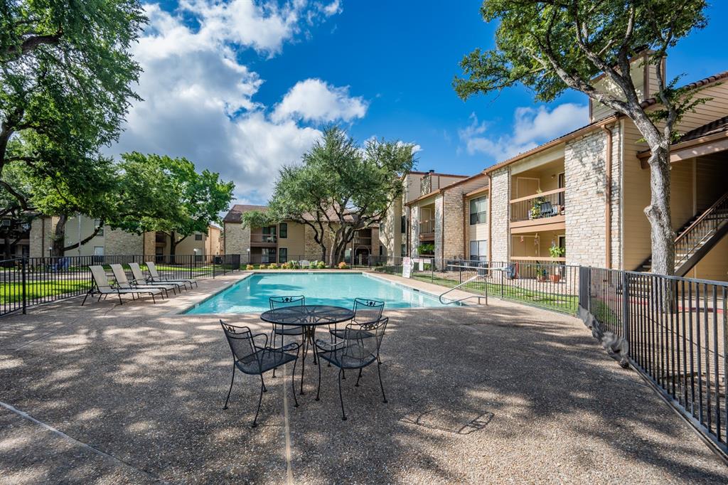 8600 Fathom Circle, Unit 1407 Austin, TX 78750 - Photo 24 of 26 a view of a house with backyard and sitting area