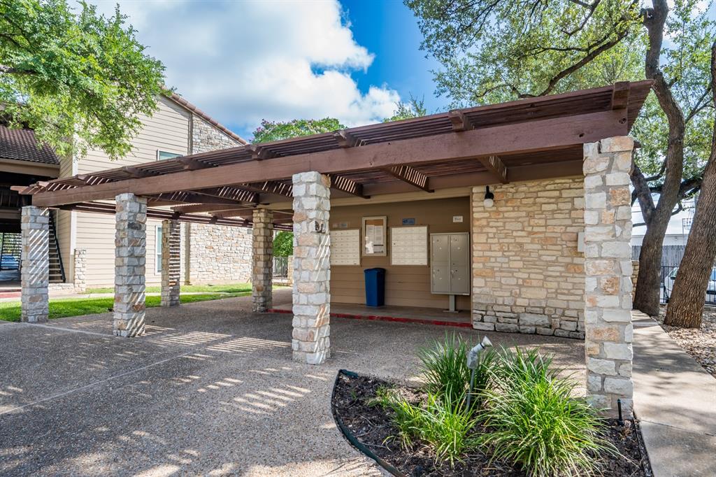 8600 Fathom Circle, Unit 1407 Austin, TX 78750 - Photo 26 of 26 a view of a house with a backyard
