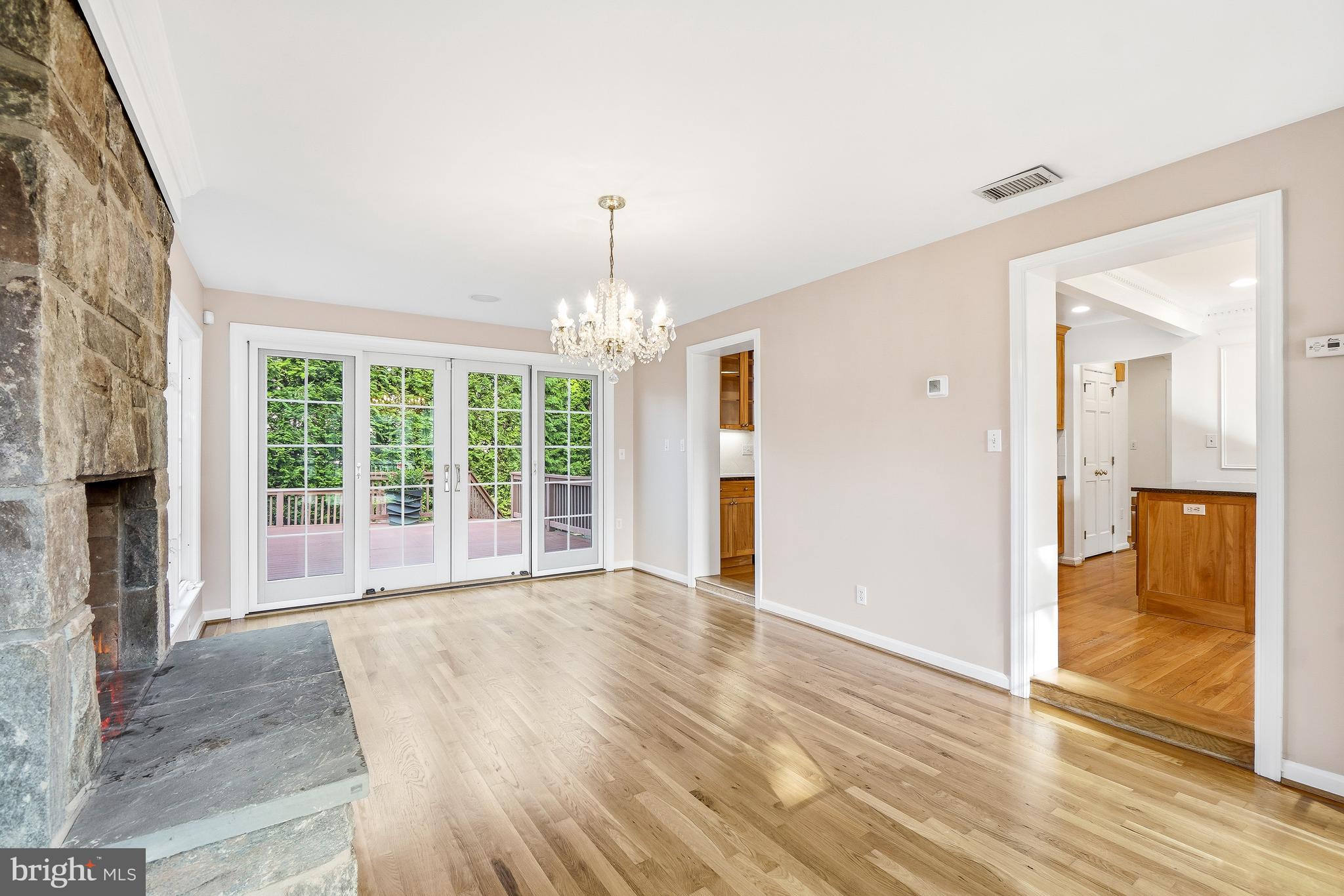 9502 Edgeley Road Bethesda, MD 20814 - Photo 10 of 46 Beautiful wall of french doors opens to deck