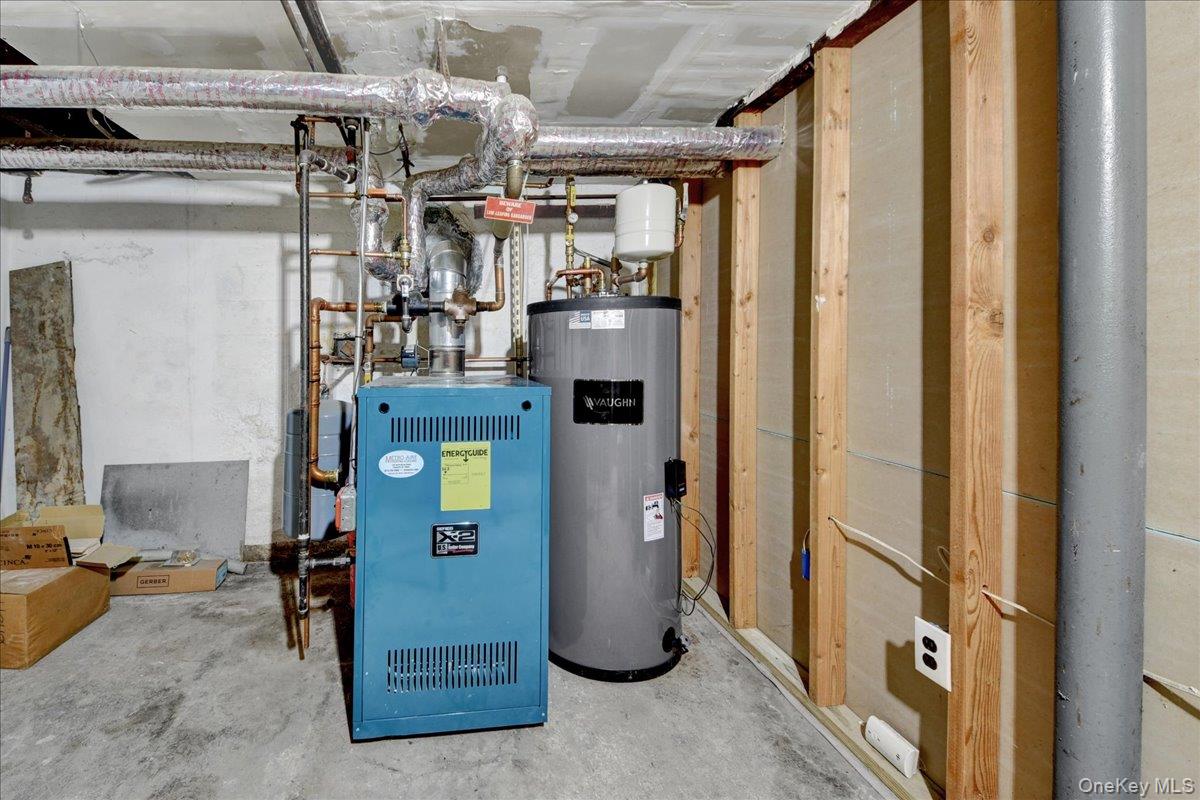 925 Reynolds Street Peekskill, NY 10566 - Photo 37 of 42 Basement - Boiler and Hot Water Tank