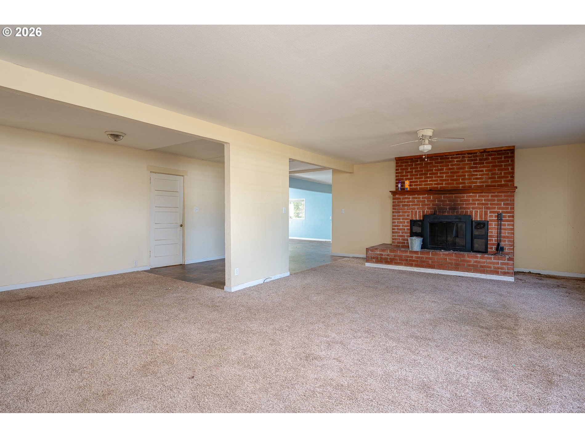 32404 Southeast Pipeline Road Gresham, OR 97080 - Photo 12 of 48 a view of empty room with a fireplace