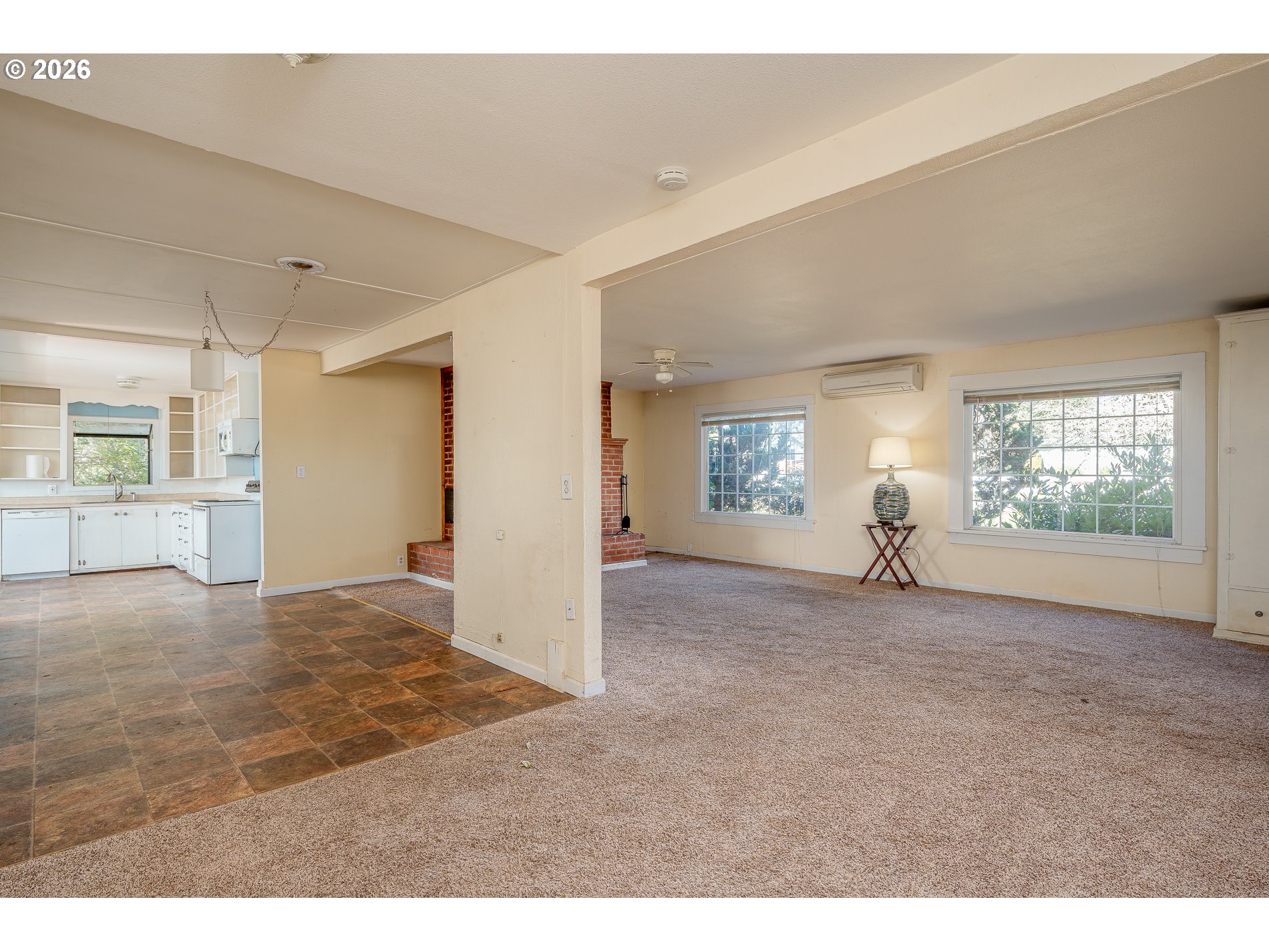 32404 Southeast Pipeline Road Gresham, OR 97080 - Photo 9 of 48 a view of a livingroom with wooden floor and windows