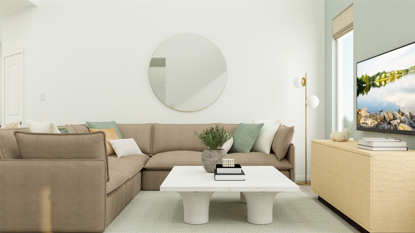 17911 Prairie Falcon Way, Unit 3 Pflugerville, TX 78660 - Photo 10 of 24 a living room with furniture a table and a mirror