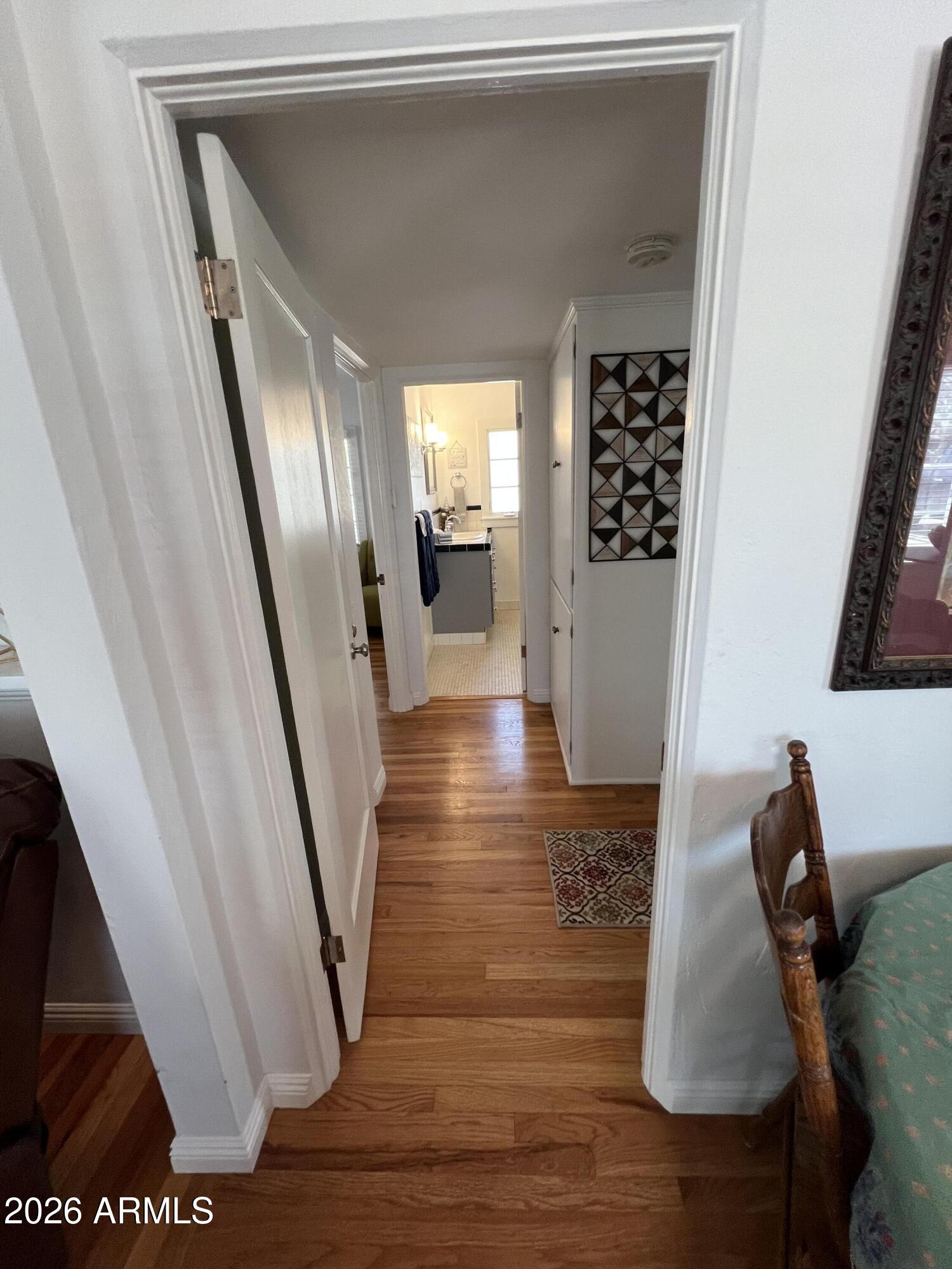 1326 East Coronado Road Phoenix, AZ 85006 - Photo 26 of 36 a view of entryway and hall with wooden floor