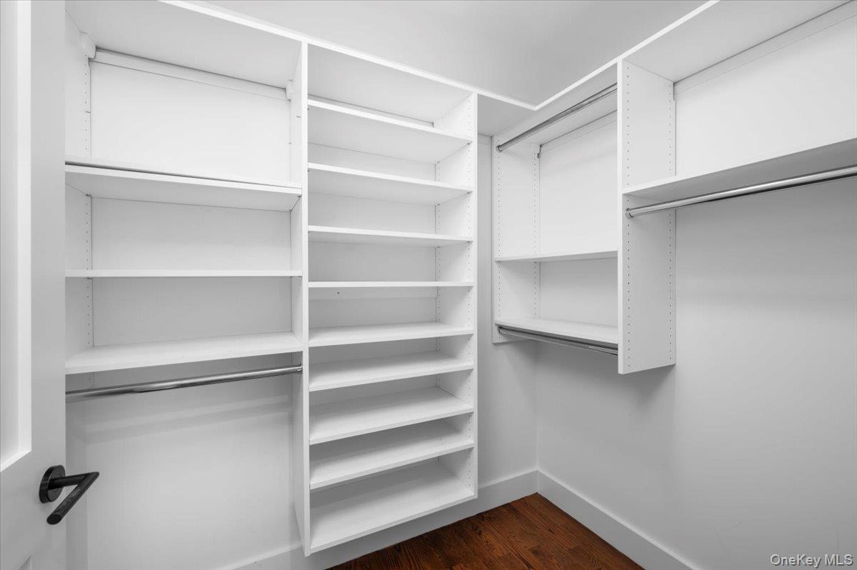 422 East Boston Post Road, Unit 303 Mamaroneck, NY 10543 - Photo 12 of 23 a view of walk in closet with empty racks