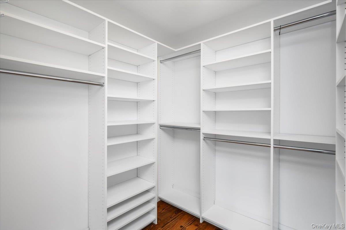 422 East Boston Post Road, Unit 303 Mamaroneck, NY 10543 - Photo 16 of 23 a view of walk in closet with empty racks