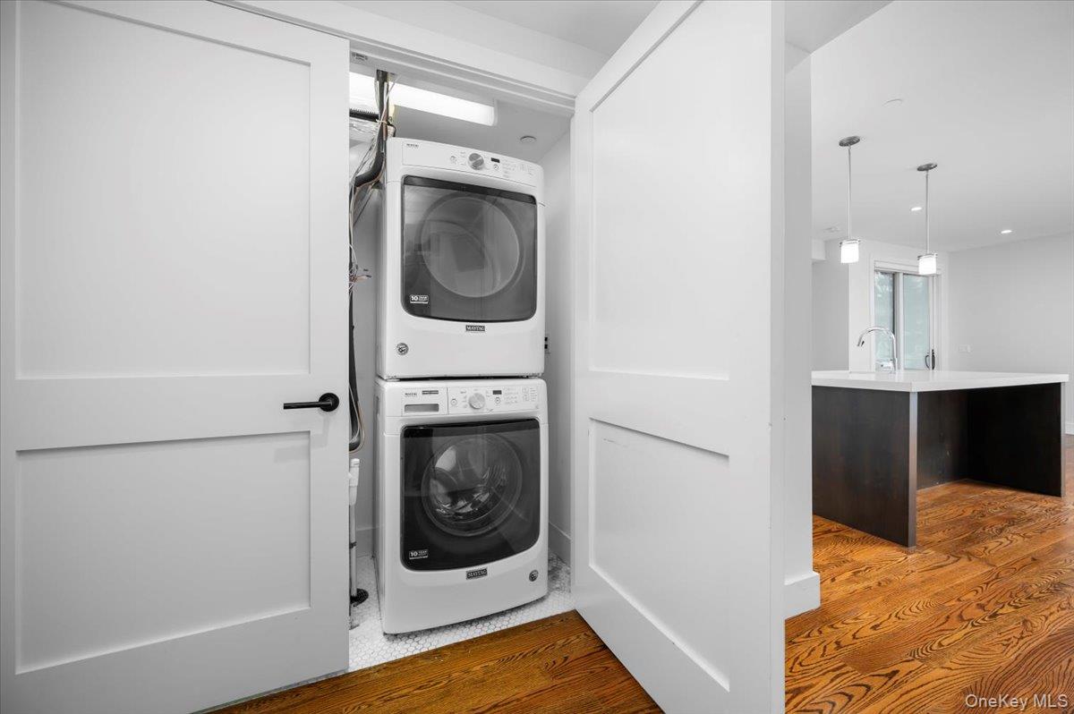 422 East Boston Post Road, Unit 303 Mamaroneck, NY 10543 - Photo 19 of 23 a view of a storage & utility room with a washer dryer