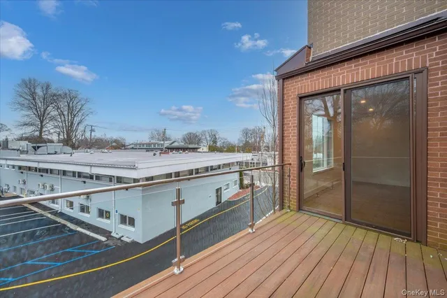 a view of balcony with hardwood floor