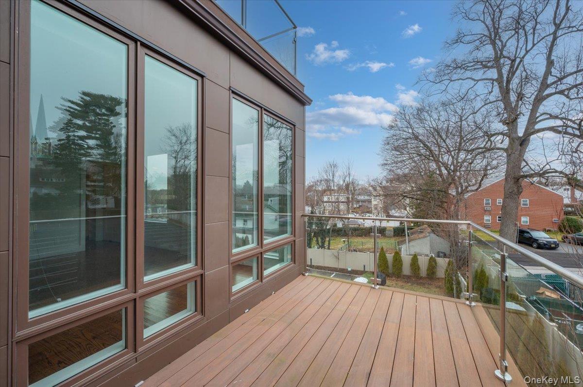 422 East Boston Post Road, Unit 303 Mamaroneck, NY 10543 - Photo 22 of 23 a view of balcony with hardwood floor