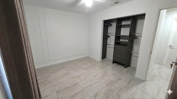 an empty room with closet