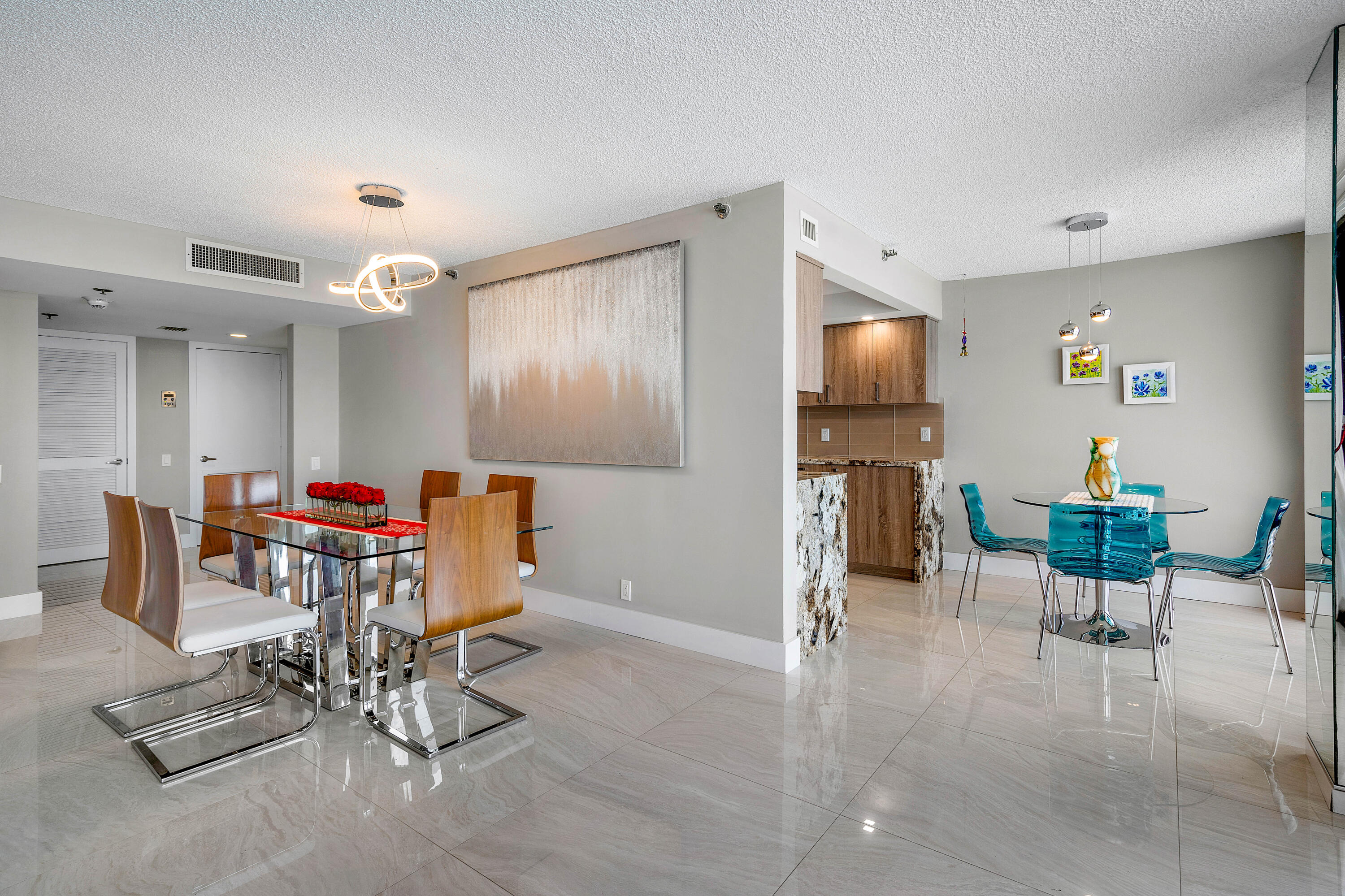 250 South Ocean Boulevard, Unit 7E Boca Raton, FL 33432 - Photo 11 of 45 a view of a livingroom with furniture and a flat screen tv