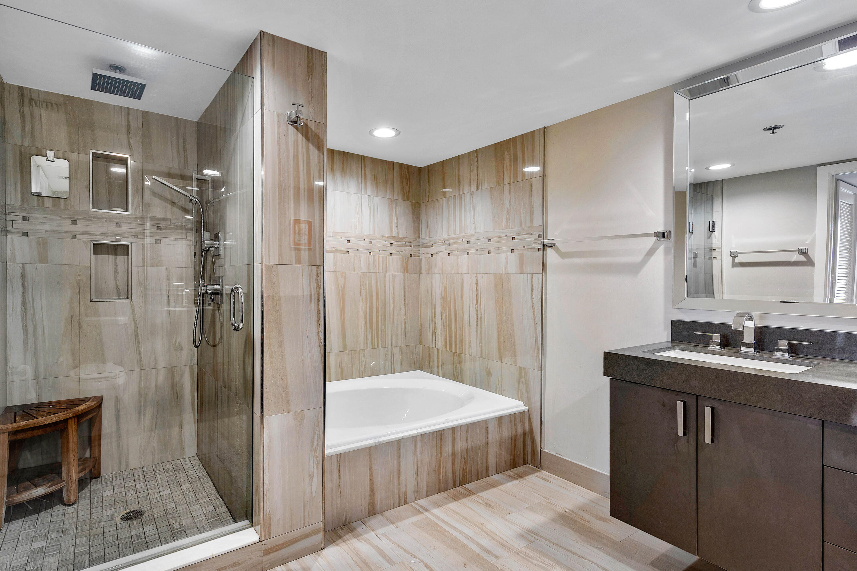 250 South Ocean Boulevard, Unit 7E Boca Raton, FL 33432 - Photo 26 of 45 a bathroom with a sink and a mirror