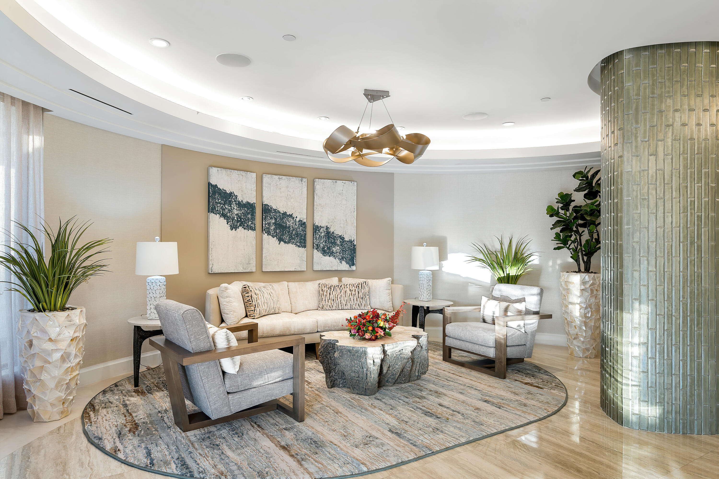 250 South Ocean Boulevard, Unit 7E Boca Raton, FL 33432 - Photo 33 of 45 a living room with furniture and a potted plant