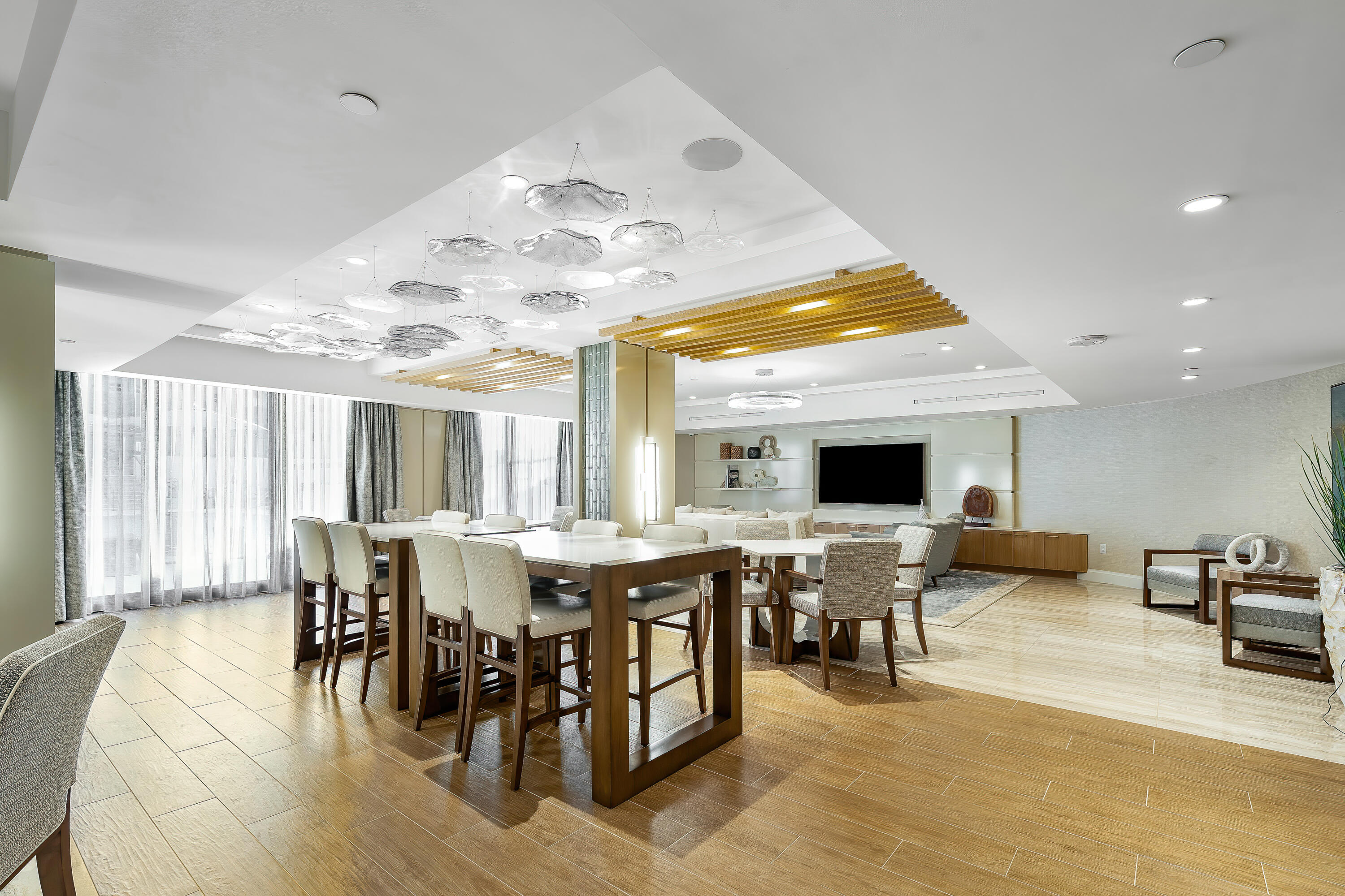 250 South Ocean Boulevard, Unit 7E Boca Raton, FL 33432 - Photo 35 of 45 a view of a dining room with furniture window and wooden floor