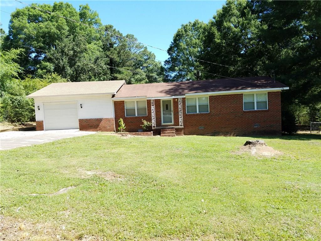 137 5th Street Calhoun, GA 30701 - Photo 1 of 1 front view of a house with a yard