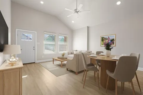 a view of a house with backyard and garden
