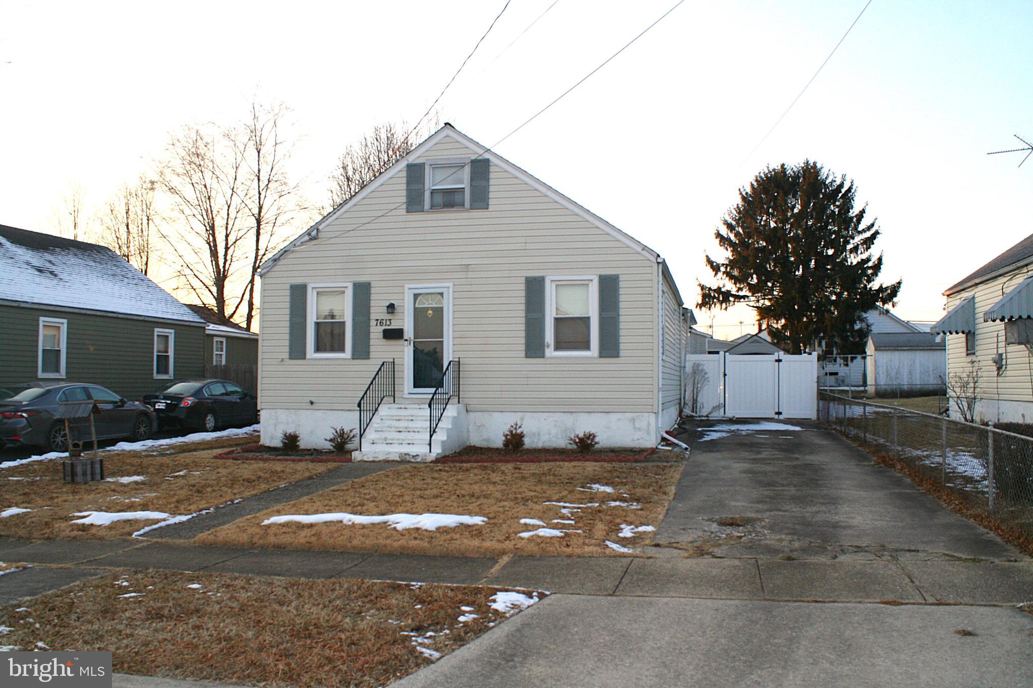 7613 Maple Road Baltimore, MD 21222 - Photo 1 of 32 a view of a house with a yard