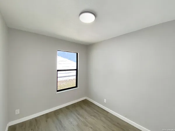 an empty room with a window