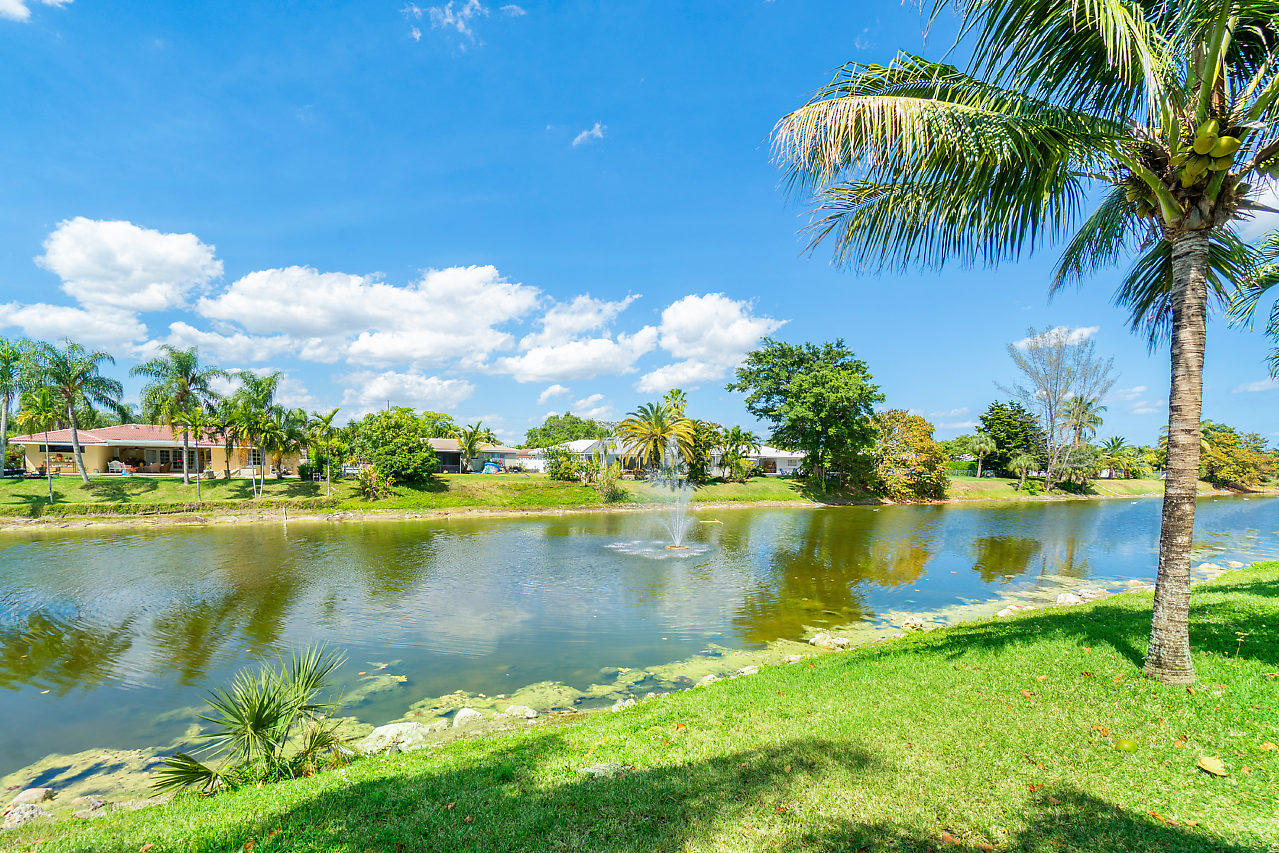 10921 Gable Street Boca Raton, FL 33428 - Photo 17 of 28 a view of a lake with a houses in the background
