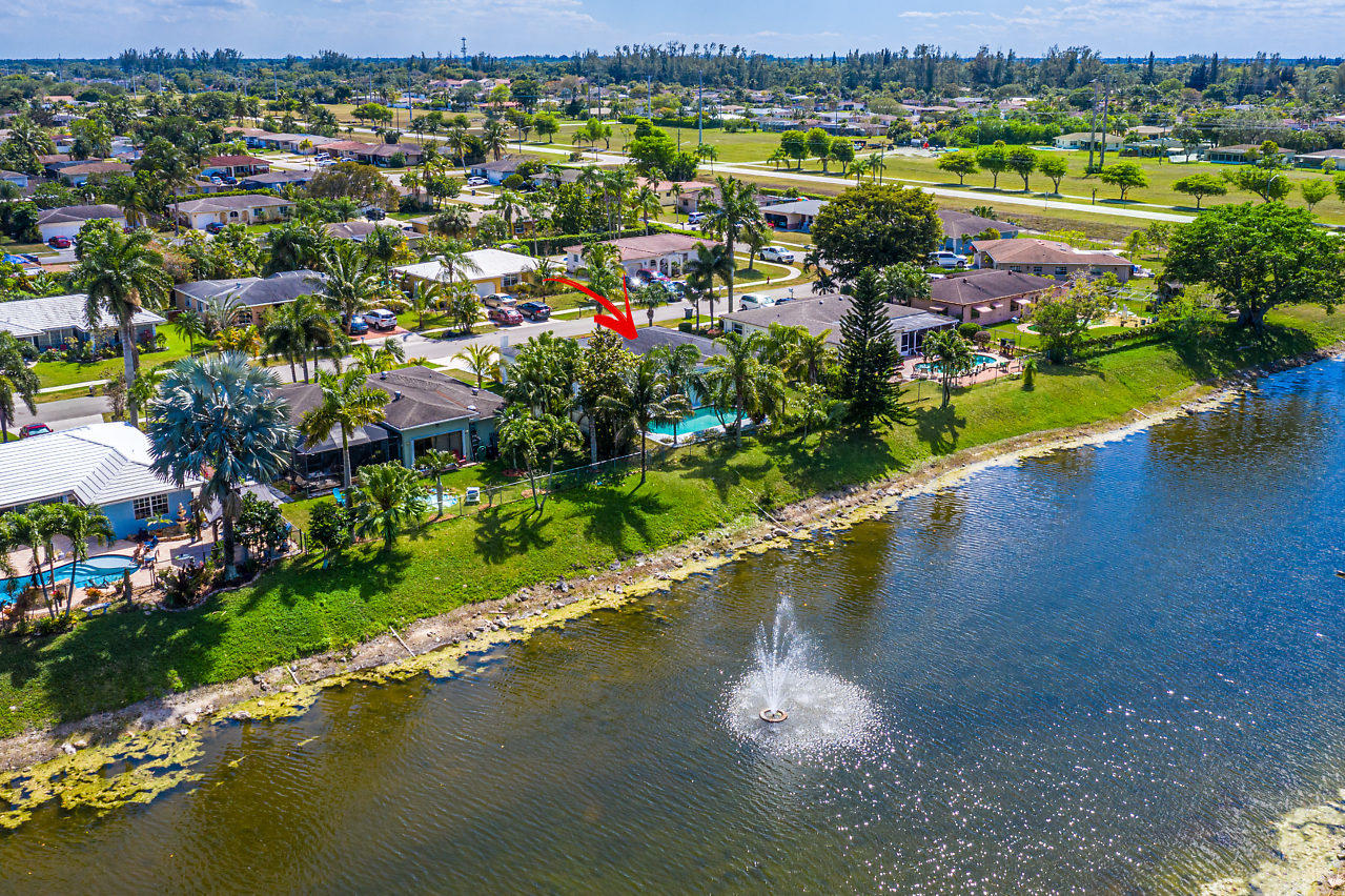 10921 Gable Street Boca Raton, FL 33428 - Photo 2 of 28 a view of a lake with a city