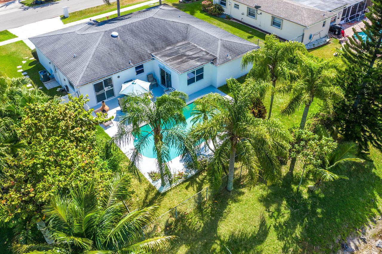 10921 Gable Street Boca Raton, FL 33428 - Photo 21 of 28 a aerial view of a house with swimming pool and garden