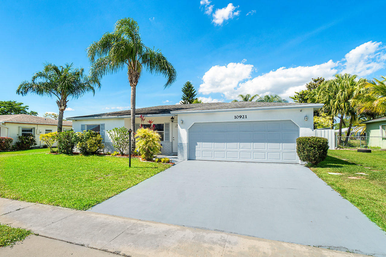 10921 Gable Street Boca Raton, FL 33428 - Photo 28 of 28 a front view of a house with garden