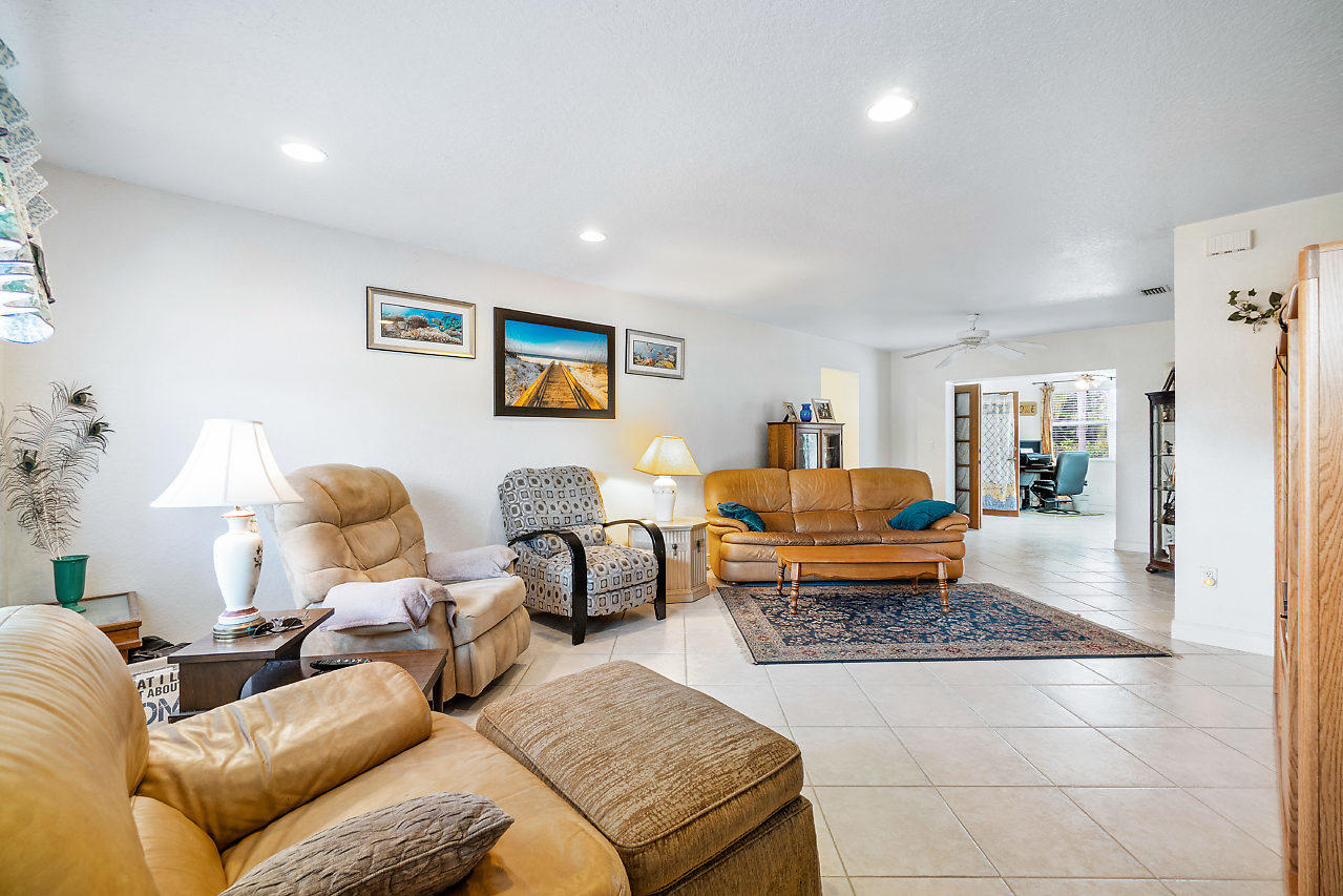 10921 Gable Street Boca Raton, FL 33428 - Photo 7 of 28 a living room with furniture and a couch