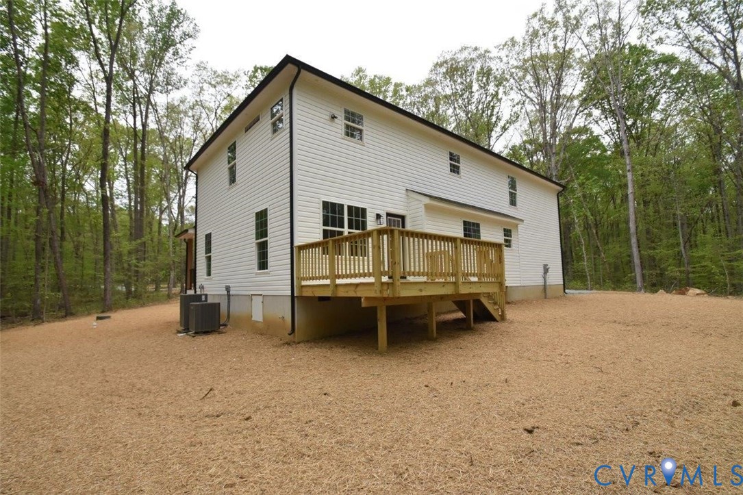 1749 Hollands Road Palmyra, VA 22963 - Photo 40 of 40 Back of house with a wooden deck and stairway