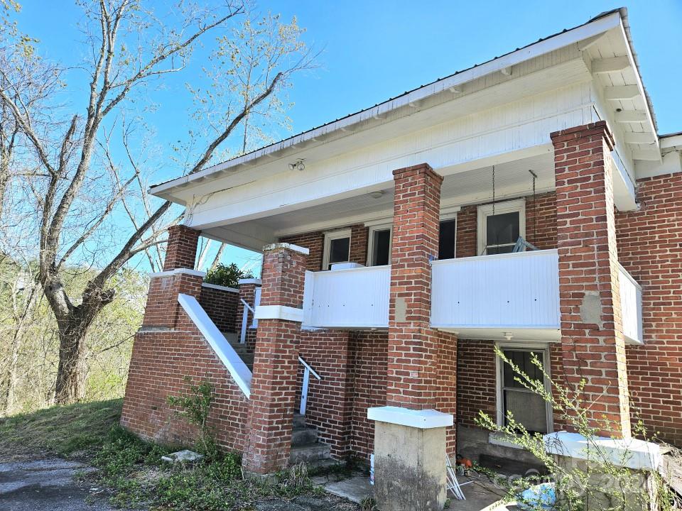 186 Rector Corner Road Marshall, NC 28753 - Photo 11 of 15 a front view of a house with garden