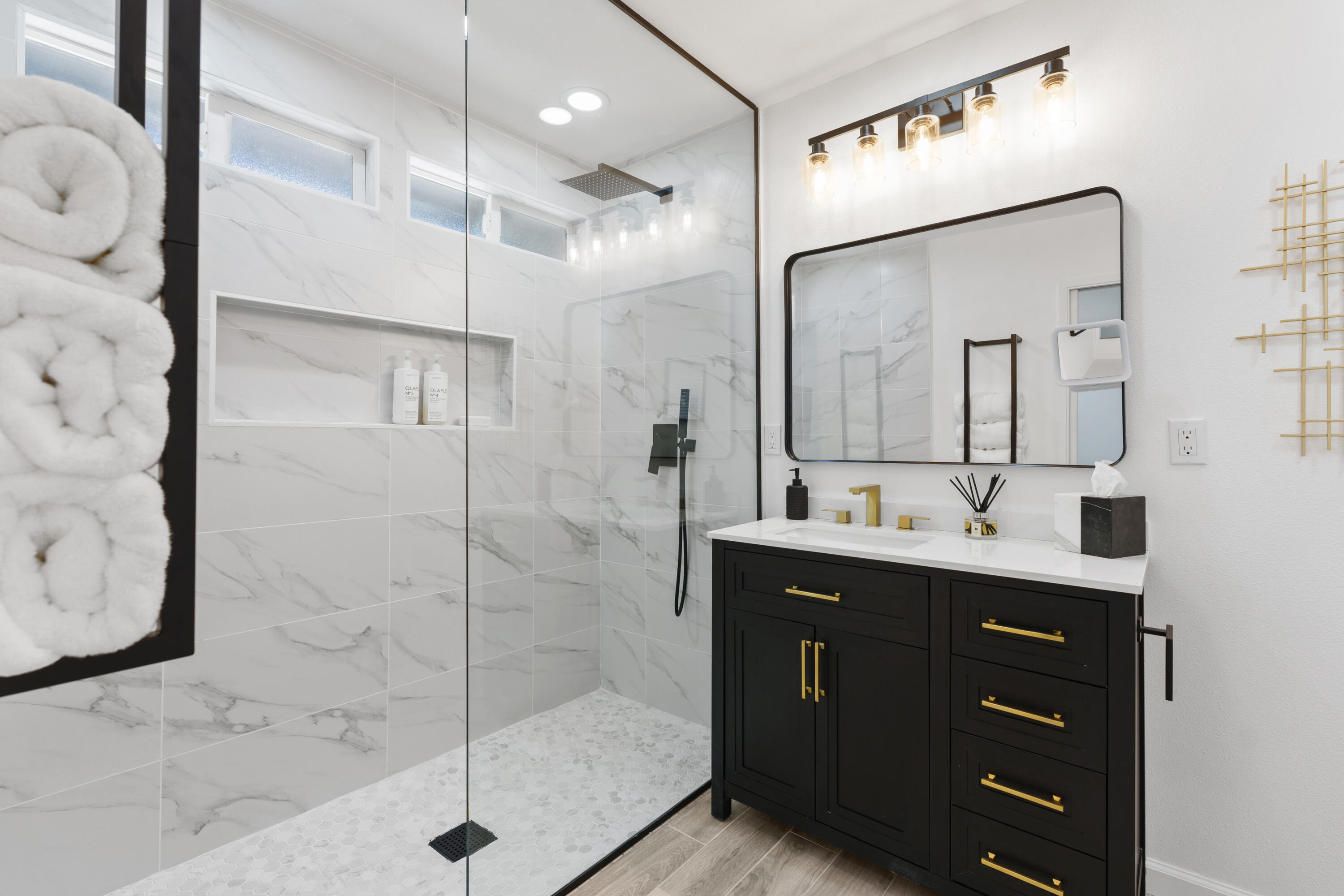 37081 Palmdale Road Rancho Mirage, CA 92270 - Photo 31 of 46 a bathroom with a double vanity sink mirror and shower