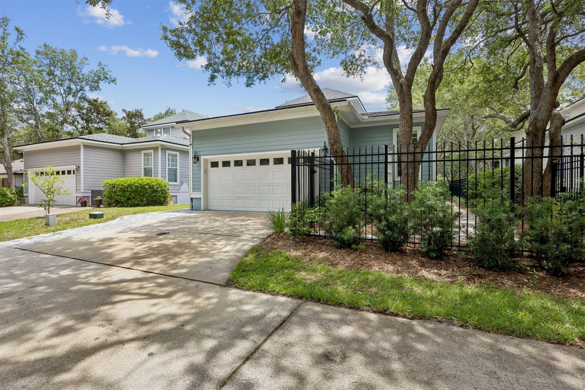 1855 Perimeter Park Road West Fernandina Beach, FL 32034 - Photo 54 of 83 This special row of homes' alley accommodates ample garage and outside parking, ideal for family and friends to park.