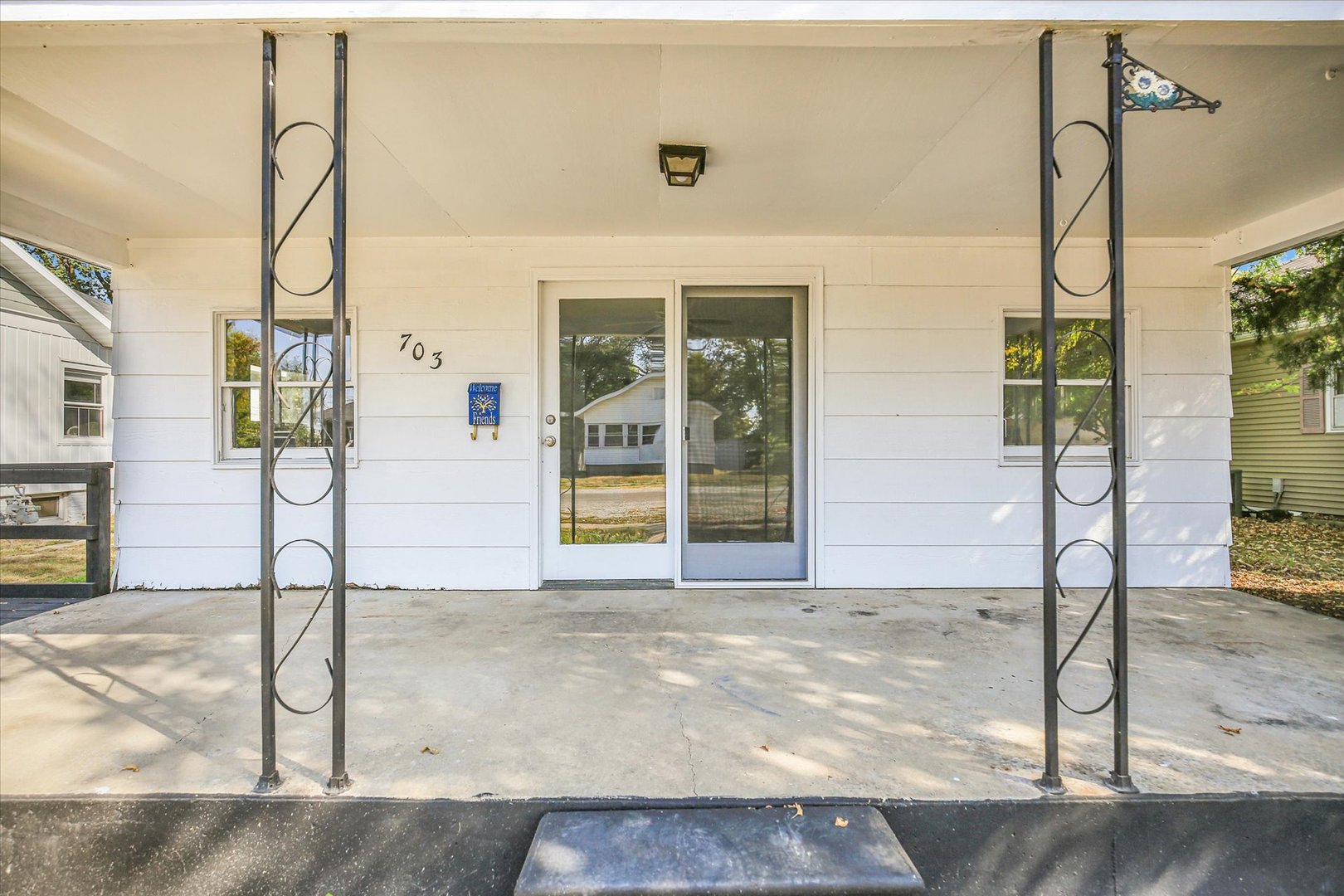 703 South Spruce Street Villa Grove, IL 61956 - Photo 13 of 28 a view of a house with street