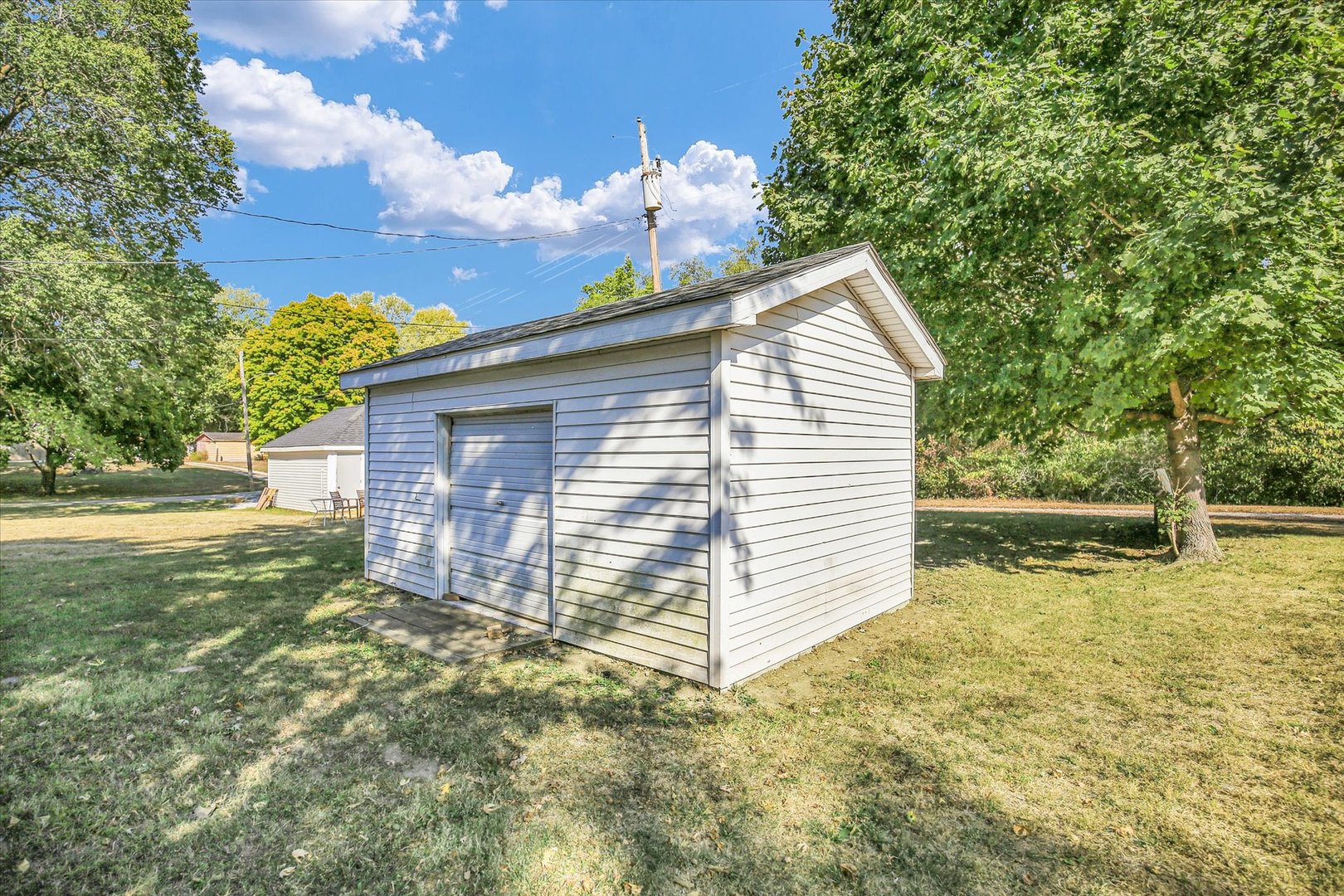 703 South Spruce Street Villa Grove, IL 61956 - Photo 27 of 28 a view of a house with a yard