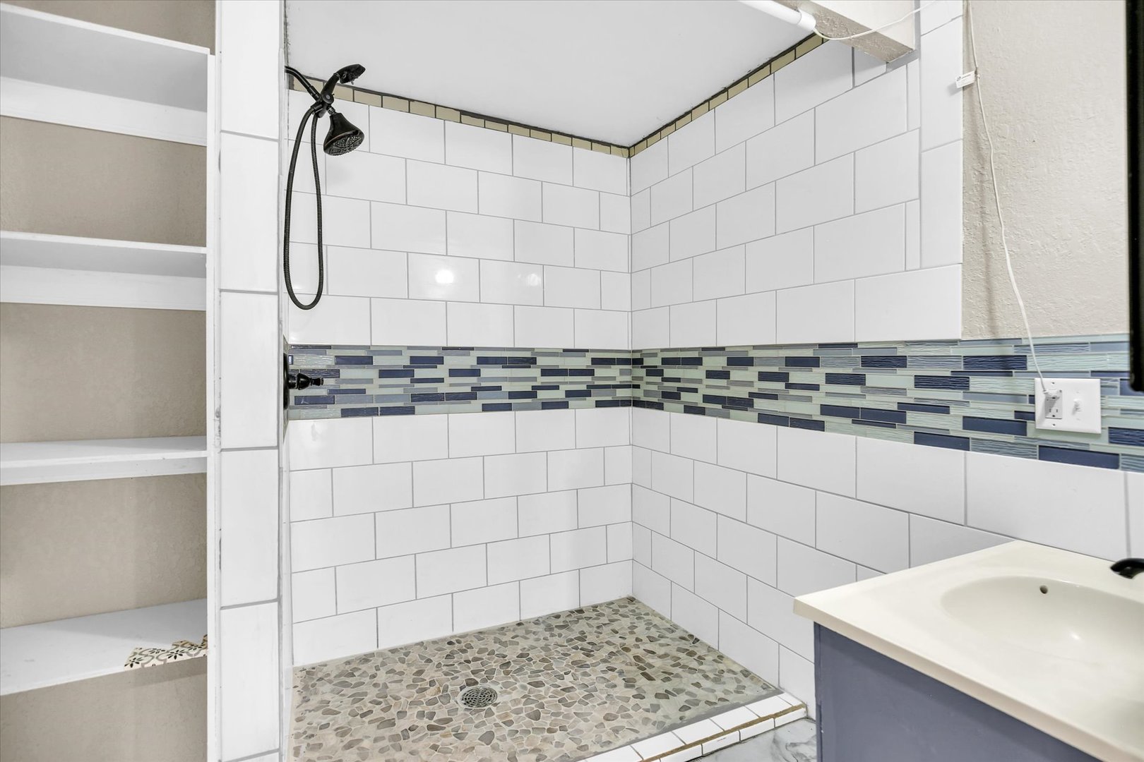 703 South Spruce Street Villa Grove, IL 61956 - Photo 4 of 28 a bathroom with a shower