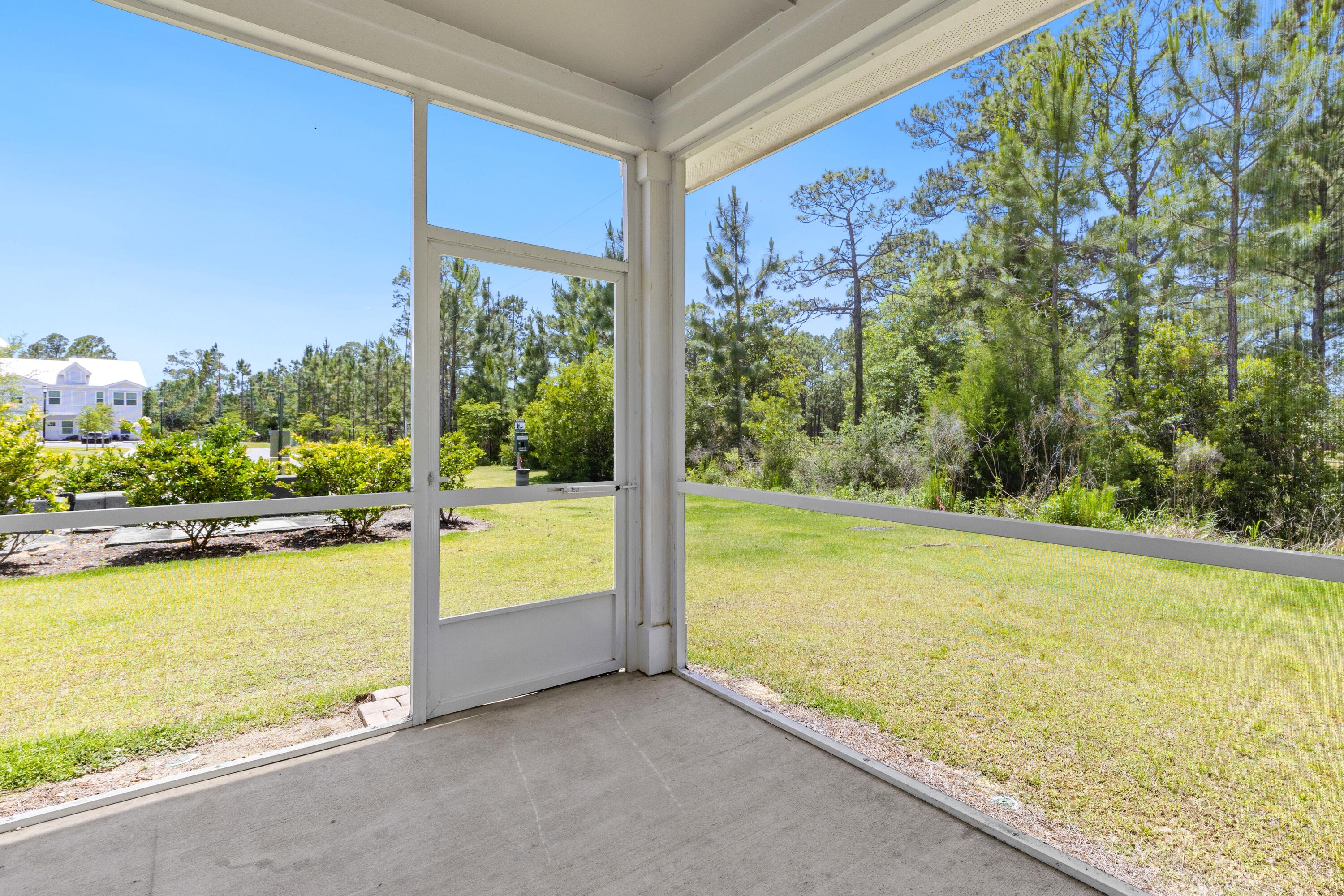 392 North Sand Palm Road Freeport, FL 32439 - Photo 19 of 36 a view of a room with an ocean from a balcony