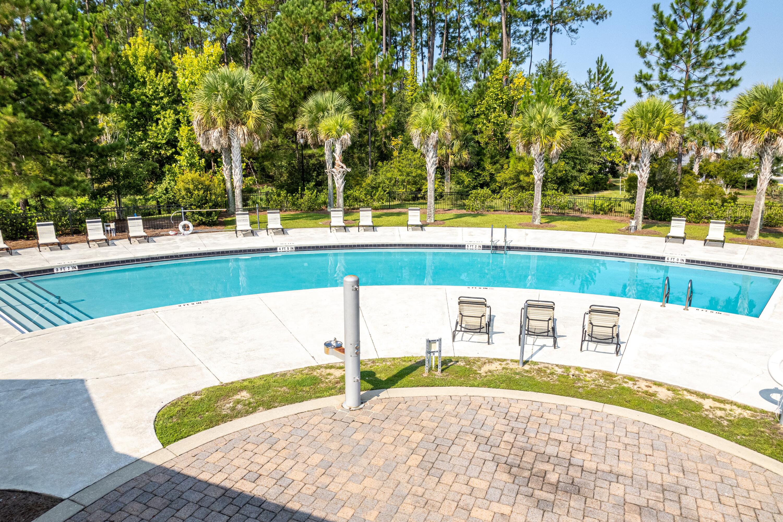 392 North Sand Palm Road Freeport, FL 32439 - Photo 24 of 36 a view of a swimming pool with an outdoor space