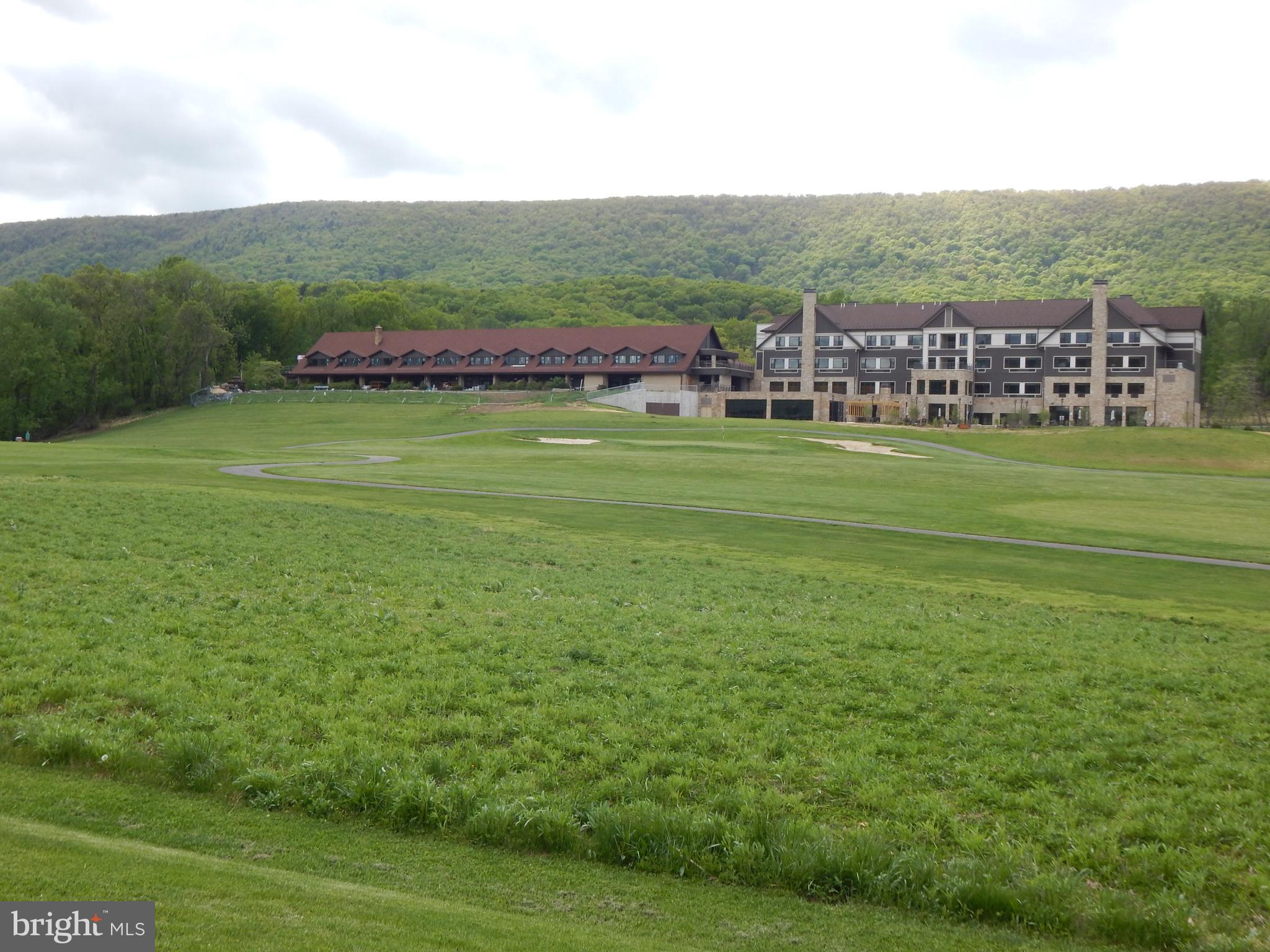 Plum Tree Lane Berkeley Springs, WV 25411 - Photo 24 of 51 a view of a green field with mountains in the background