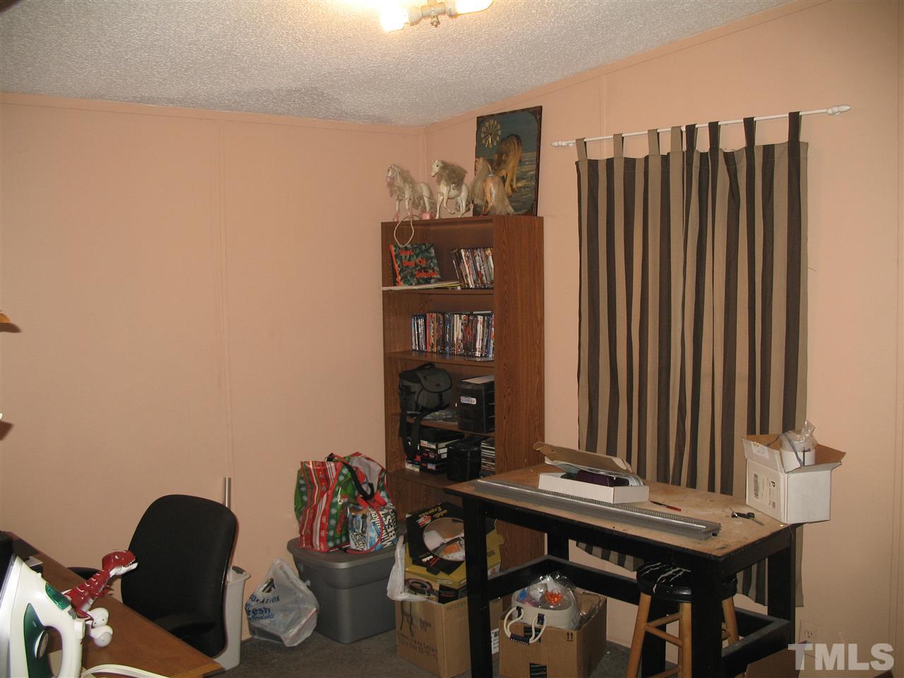 145 Ridgewood Drive Middlesex, NC 27557 - Photo 17 of 20 a view of a workspace with furniture
