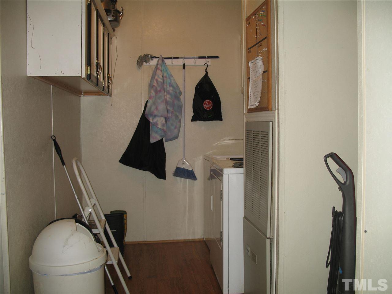 145 Ridgewood Drive Middlesex, NC 27557 - Photo 20 of 20 a bathroom with a toilet and a sink