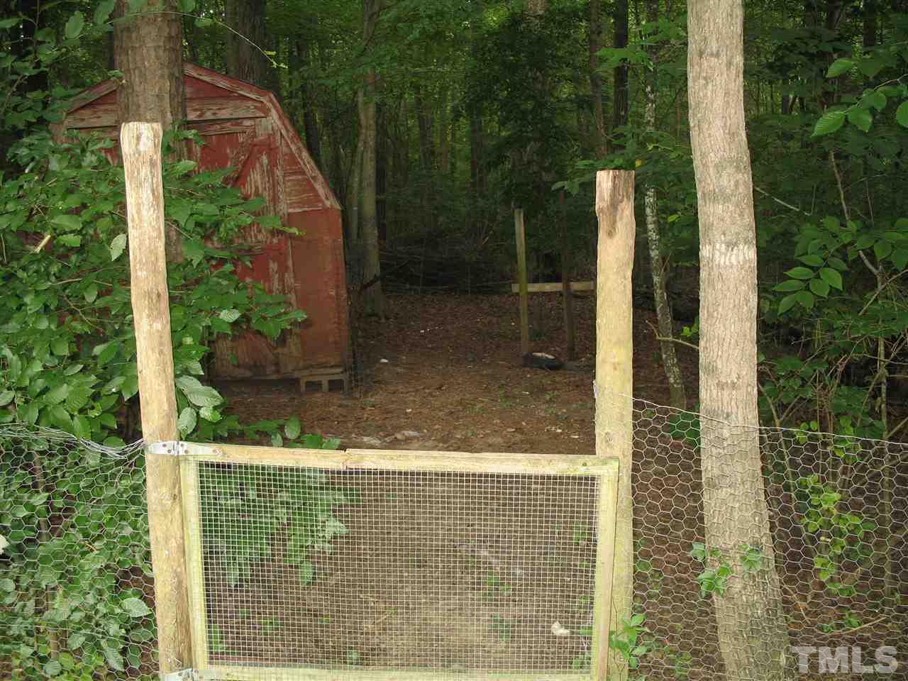 145 Ridgewood Drive Middlesex, NC 27557 - Photo 4 of 20 a view of fountain in the back yard