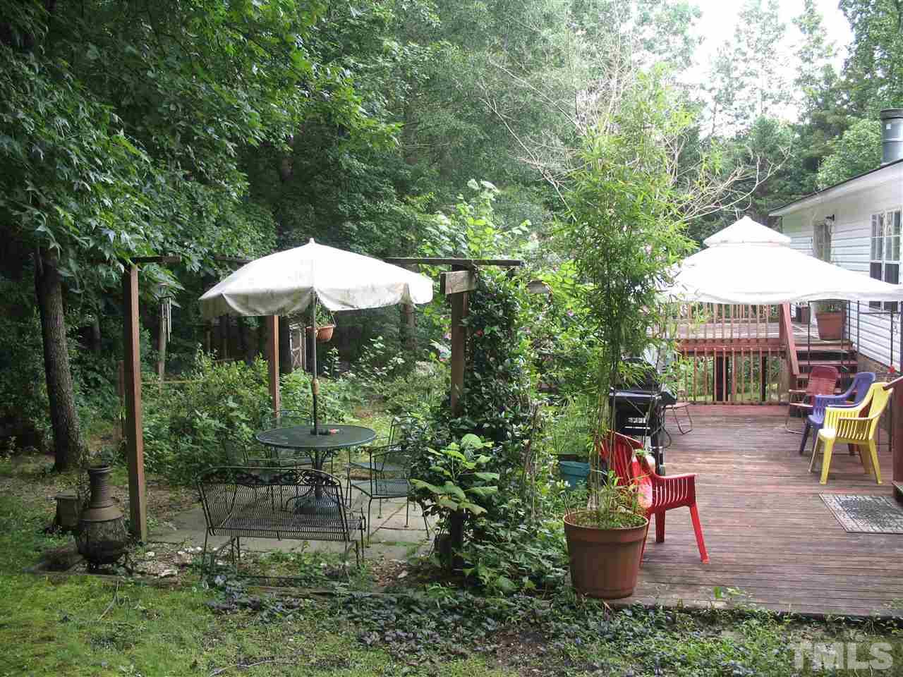 145 Ridgewood Drive Middlesex, NC 27557 - Photo 7 of 20 a garden view with a seating space