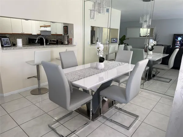 a view of a dining room with furniture