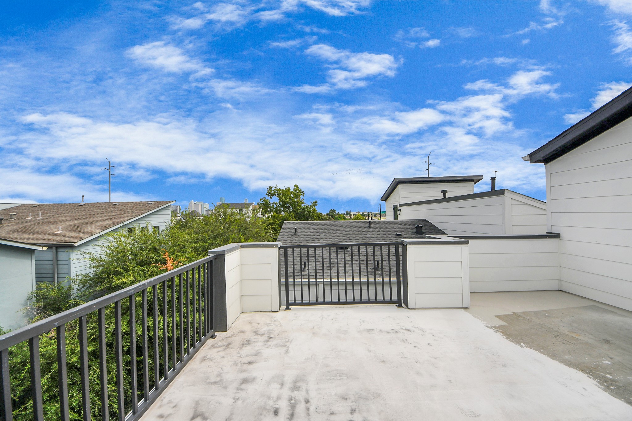 2014 Blodgett Street Houston, TX 77004 - Photo 43 of 49 a view of a balcony with wooden fence