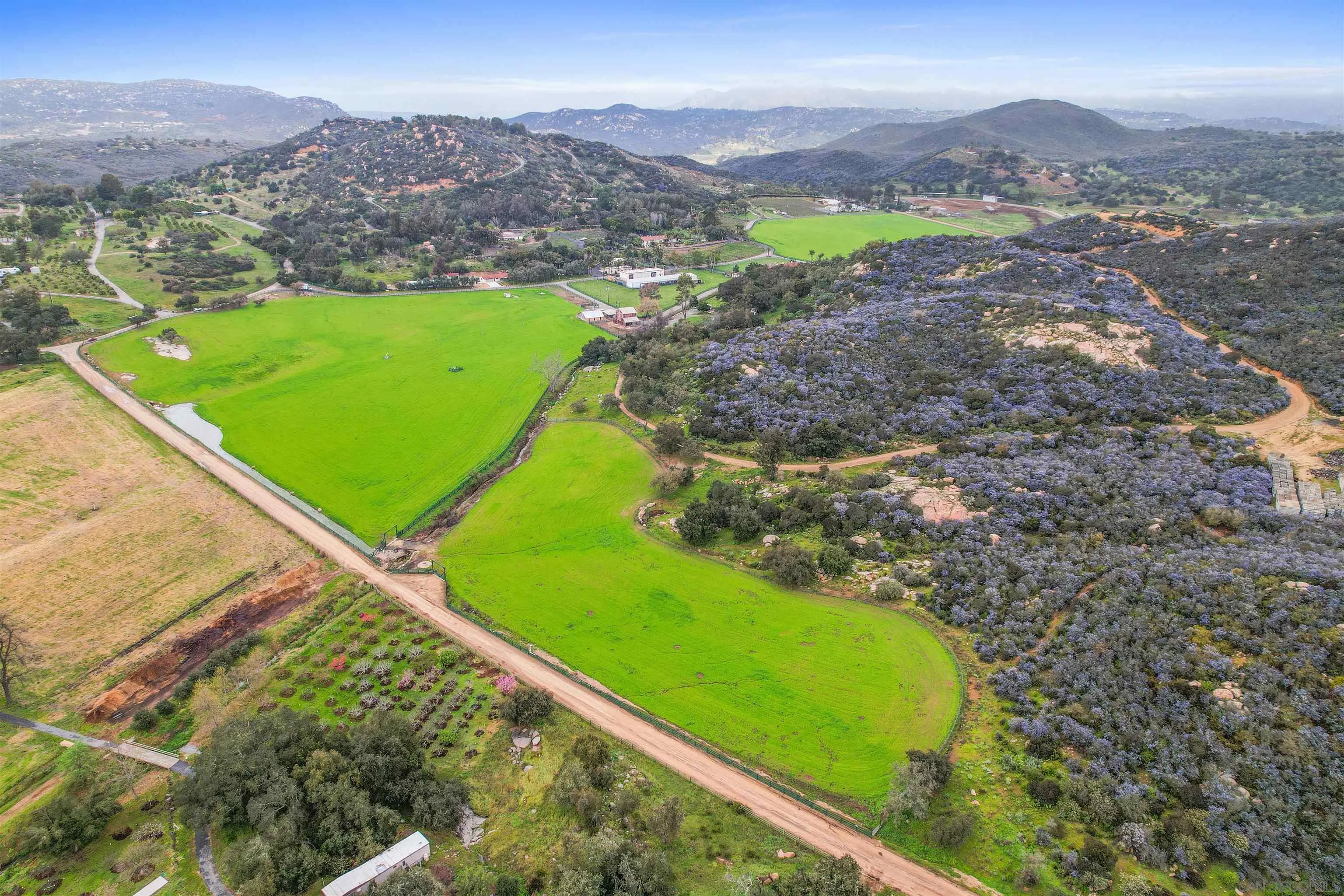 16757 Old Guejito Grade Road Escondido, CA 92027 - Photo 33 of 38 a view of a field with mountains in the background