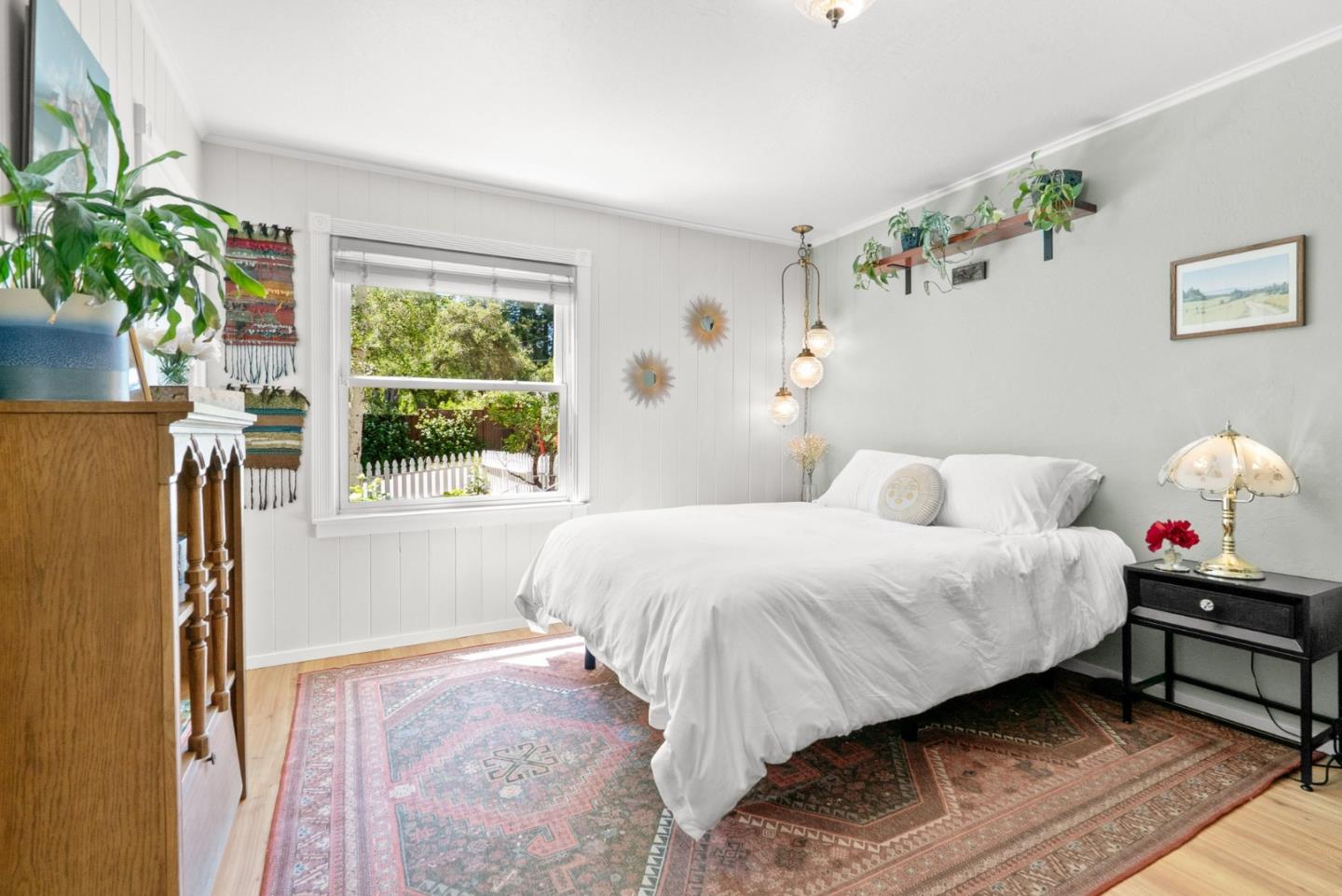 280 Main Street Ben Lomond, CA 95005 - Photo 18 of 47 a bedroom with a bed table flowerpot and window
