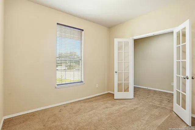 an entryway with table and window