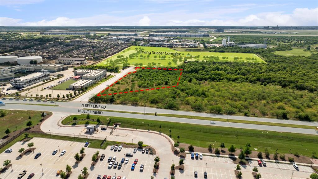 5200 North Belt Line Road Irving, TX 75038 - Photo 36 of 40 a view of a swimming pool with a yard